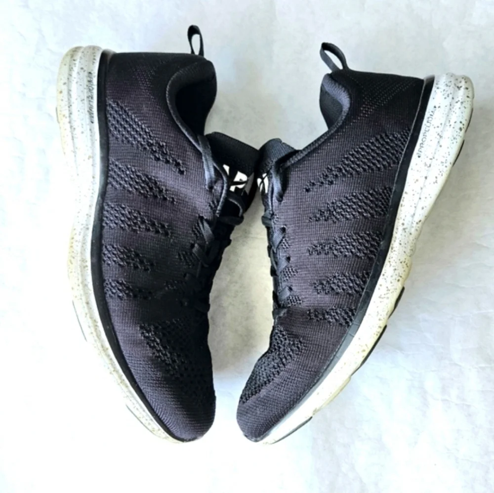 APL Techloom Pro black running shoes speckled soles